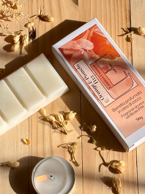 Barretta profumata Orange & Pomelo Fizz in confezione colorata, ideale per uno snack fresco e aromatico.